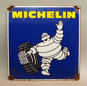 
	
		Two Michelin tyre tin plate and enamel signs, mid 20th century, printed with lettering to...
