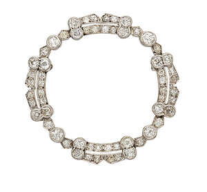 
	
		An Art Deco, gold and diamond brooch, of garland design set with old mine-cut diamonds...