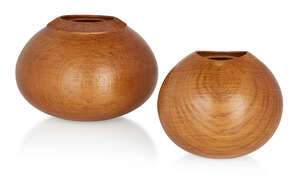 
	
		Liam Flynn (1969-2017), 
		 
		Two turned ovoid vessels, circa 1995, 
		Brown oak,...