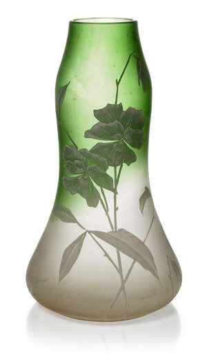 
	
		An Art Nouveau painted glass vase   
		c.1900  
		The shaped and frosted vase shaded...