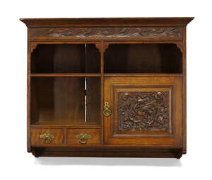 
	
		Arthur W. Simpson (1857-1922), an Arts and Crafts carved oak hanging cupboard  
		