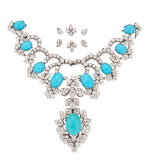 A turquoise and diamond set necklace section, with a drop designed as an oval cabochon turquoise...