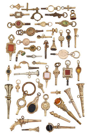 
	
		A collection of pocket watch keys of various designs, including a pistol and a rotating...