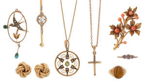 
	
		A group of jewellery comprising: a bar brooch; a pair of knot earrings; a coral spray...