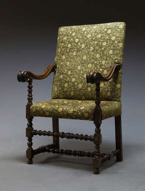 
	
		A Continental walnut open arm chair, 17th Century and later, with scrolling armrests,...