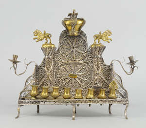 
	
		A silvered brass Hannukah lamp of the Baal Shem Tov type, probably Polish, mid-19th...