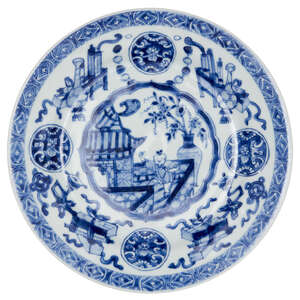 
	
		A Chinese porcelain dish, Kangxi period, painted in underglaze blue to the central...