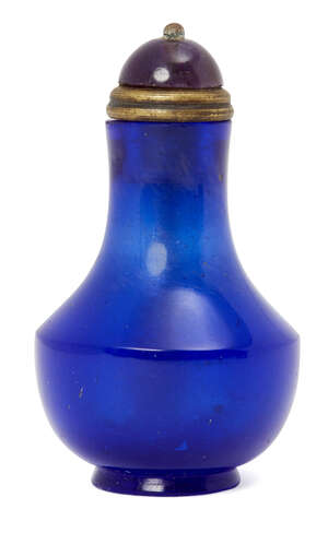 
	
		A Chinese Peking glass snuff bottle, 19th century, of midnight blue tone, with slender...