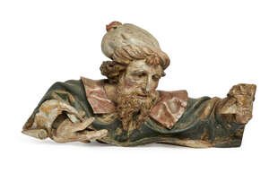 
	
		A Continental carved and painted wood fragmentary figure of a man, 17th/18th century, 
