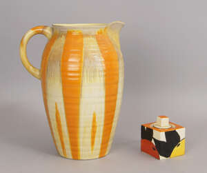 
	
		A Clarice Cliff 'Bizarre' oranges pattern ink well and cover, 8cm high, together with a...