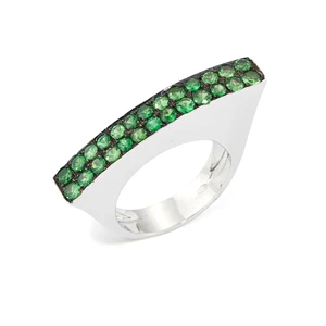 A tsavorite garnet ring, designed as a two row tsavorite garnet set bar, to asymmetric shoulders...