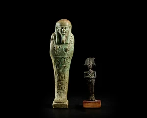 An Egyptian bronze Osiris amuletLate Period-Ptolemaic Period, circa 664-30 B.C. and an Egyptian...
