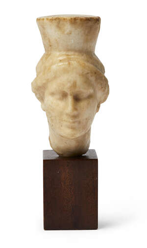 
	
		A marble female caryatid head, Greek Hellenistic Period, circa. 1st Century B. C., 12cm...