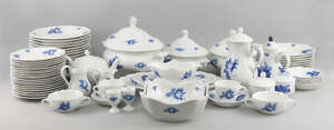 A German blue and white floral dinner and tea service by Hutschenreuther, with printed decoration, to comprise two coffee pots, two tea pots, two hot water pot