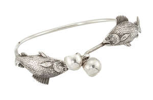 
	
		A Victorian silver bangle, by Robert Philipps, designed as two fish swimming towards...