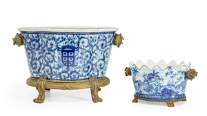Two Continental glazed earthenware blue and white jardini&egrave;res, late 19th / early 20th century,...