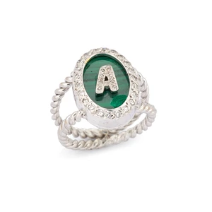 An 18ct white gold malachite and diamond initial ring, composed of an oval-shaped malachite...