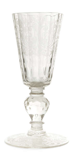 
	
		A large Bohemian etched glass faceted goblet, early 18th century, the bowl decorated with...