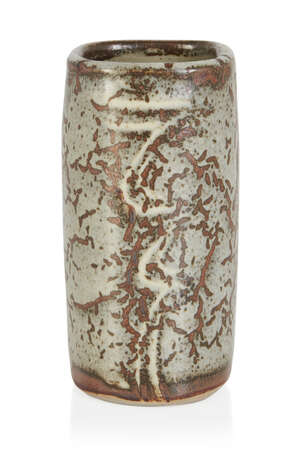 Lowerdown Pottery (probably David Leach)
Squared cylindrical vase with cream glaze and brush...