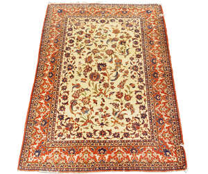 
	
		An Ispahan rug, early/mid 20th century, with foliate stem in an ivory field, the deep red...
