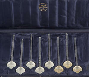 
	
		René Lalique (1860-1945), a set of eight clear and frosted glass cocktail sticks 
		Barr