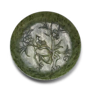 
	
		A Chinese spinach jade marriage dish, late Qing dynasty, carved in low relief with an...