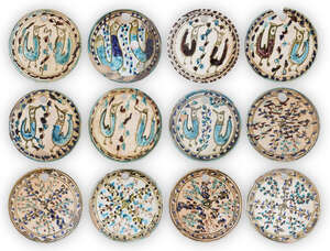 
	
		A group of Qajar pottery bee-hive covers, Iran, 19th century, each of circular form with...