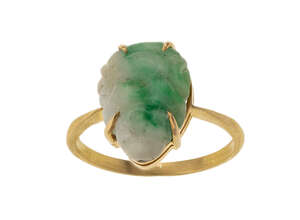 
	
		A carved jadeite jade ring, the single jade plaque carved as the Buddha, in claw-set...