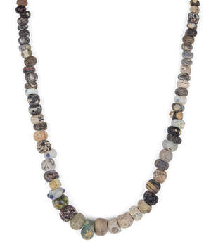 
	
		A Phoenician glass bead necklace 
		Circa 6th-2nd Century B.C. 
		Composed of sixty...