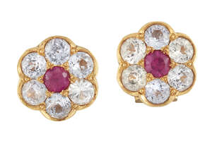 A pair of synthetic ruby and colourless gem earrings, of flowerhead cluster design, each circular synthetic ruby centre within a circular colourless gem surrou