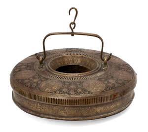 
	
		A Qajar openwork brass lantern, Iran, 19th century,  of circular form with strap handle...