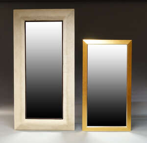 
	
		A large contemporary mirror, of rectangular form, with bevelled plate, the border...