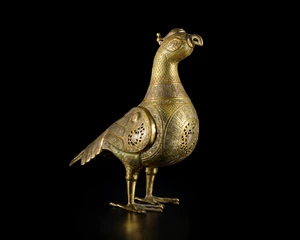 TO BE SOLD WITH NO RESERVE
A large silver inlaid brass open work model of a bird, Modern, 21st...