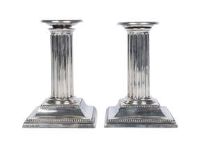
	
		Two silver dwarf candlesticks, Sheffield c1899 & 1901, Hawksworth, Eyre & Co Ltd, with...