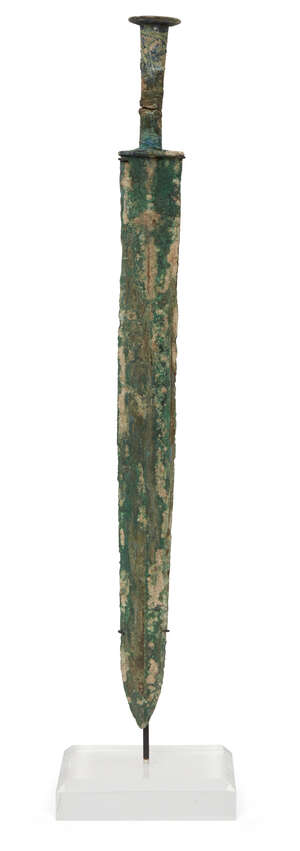 
	
		A Chinese bronze sword, jian, Warring States period, with tapered double-edged blade,...