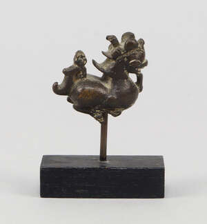 
	
		A Burmese bronze opium weight, 17th/18th century, on a later stand, the weight 4cm...