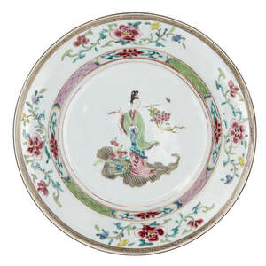 
	
		A Chinese porcelain famille rose dish, Yongzheng period, painted to the central reserve...