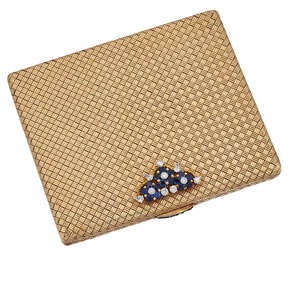 
	
		A diamond and sapphire-set compact, the rectangular compact of basket weave design with...