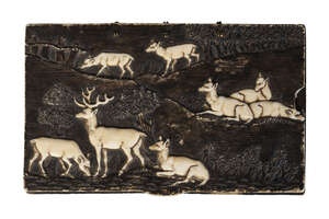 
	
		A Swiss or South German 'Black Forest' relief carved and stained ivory box, late 19th...