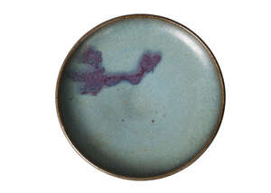 ***Amendment: Please note that the label previously on the base of this bowl was deemed a copy, and has since been removed*** A Chinese Jun ware purple-splashe