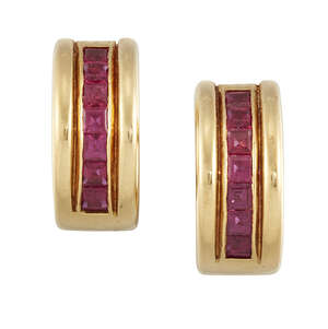 
	
		A pair of ruby earrings, of hinged hoop design, the front set with a line of square-cut...