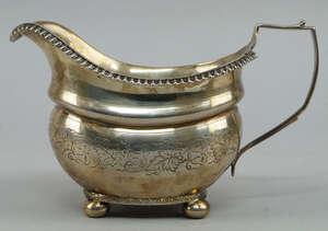 
	
		A George III silver milk jug, London c.1812, Rebecca Emes & Edward Barnard I, with fluted...