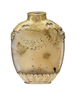 
	
		A Chinese agate ovoid snuff bottle, mid-19th century, the brass mounts decorated with...
