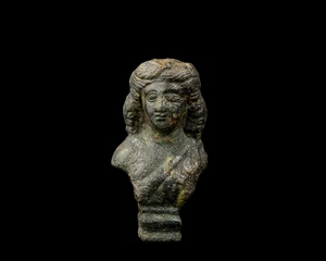 A Roman bronze stool support with the bust of a youth, Circa 2nd-3rd Century A.D.,
On a stepped...