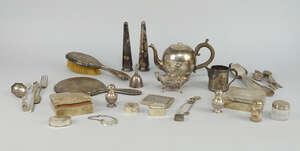 
	
		 A miscellaneous collection of silver and plate, to include a miniature vinaigrette,...
