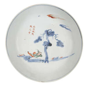 A rare Chinese porcelain kosometsuke wucai dish, Tianqi period, decorated with a boy sleeping beneath a pine tree, the underside painted with butterflies and f