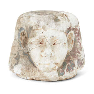 
	
		An Egyptian style limestone canopic jar stopper in the form of human-headed Imsety, with...
