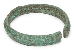 
	
		A Chinese bronze neck ring, Neolithic period, with central ridge, heavily encrusted, 13cm...