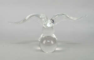 
	
		 James Houston for Steuben, a glass model of an eagle perching on a ball, designed 1964,...