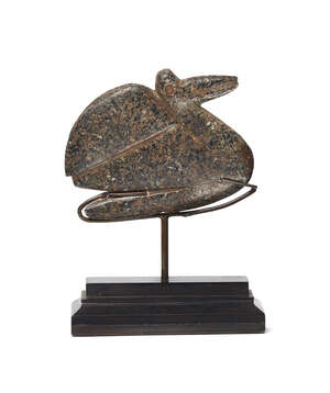
	
		A stone pelican amulet, Egypt, Pre-Dynastic period, 3rd millenium BC, with flattened...